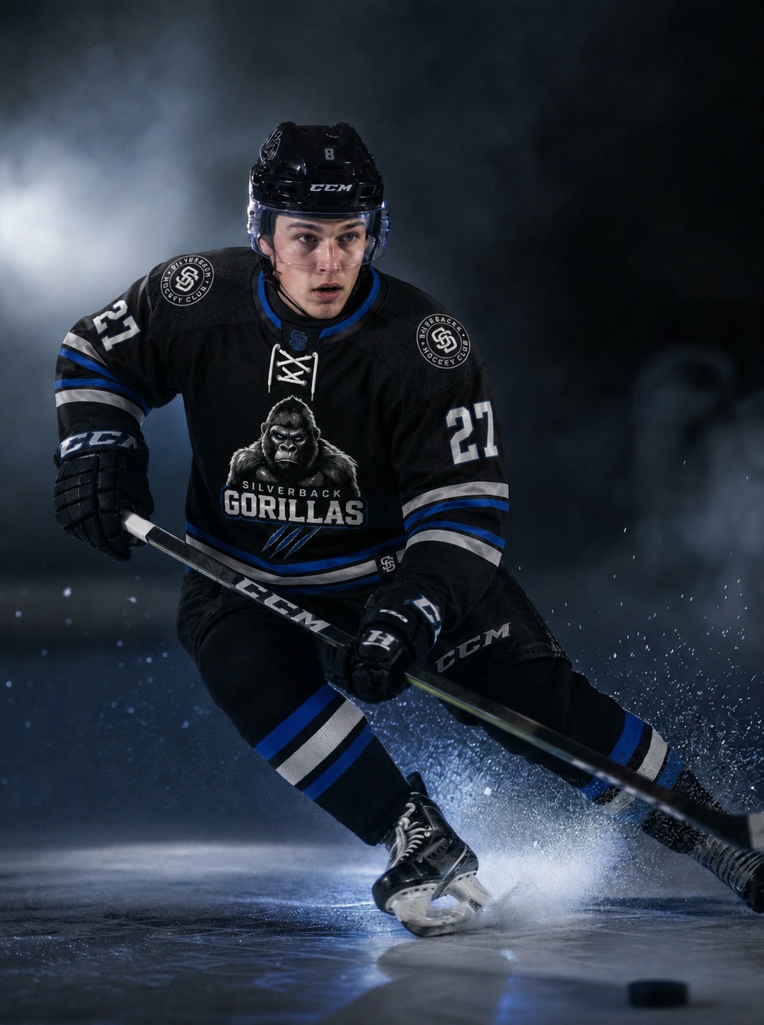 Silverbacks player driving across the ice in the official dark jersey